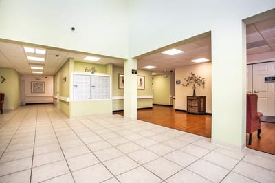 Interior view of a common area with bulletin board