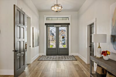 Interior view of a welcoming entryway with doors.