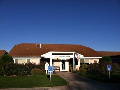 Exterior view of Maryland Village facility with clear sky