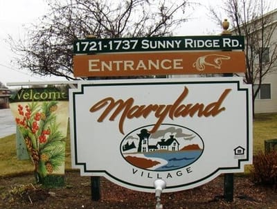 Sign of Maryland Village at the entrance