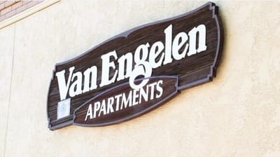 Sign for Van Engelen Apartments on the exterior