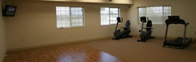 Interior view of a fitness area with equipment