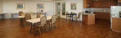 Interior view of a common area with tables and chairs