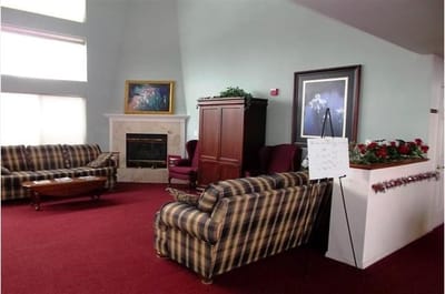 Lounge area with comfortable seating and fireplace