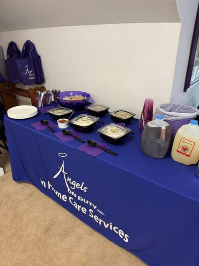 Table set with meals for a community event