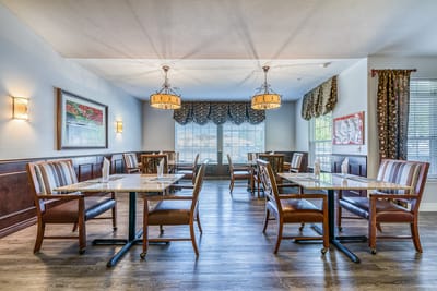 Dining area with well-set tables and good lighting