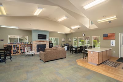 Common area with seating and bookshelves
