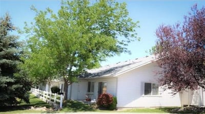 Exterior view of the facility with landscaping
