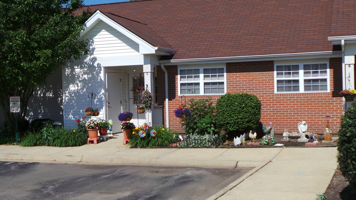 Exterior view of the facility entrance with flowers
