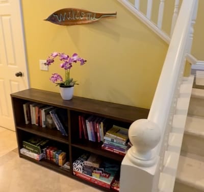Welcoming interior space with books and flowers