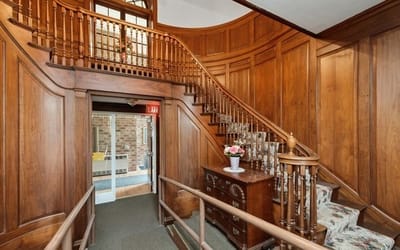 Elegant wooden staircase in facility interior