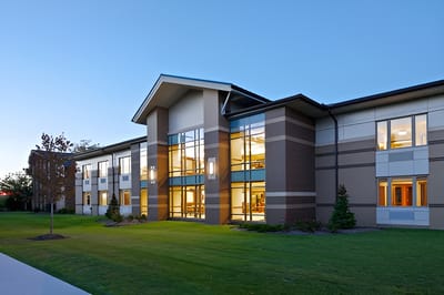 Exterior view of assisted living facility at dusk