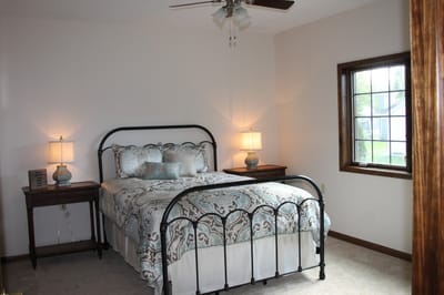 Cozy bedroom with a bed and window light