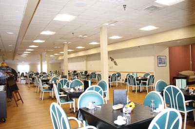 Dining room with tables set for meals