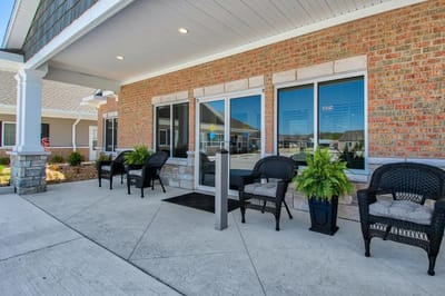 Welcoming outdoor seating area in front of the facility