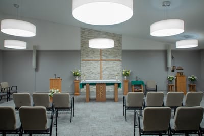 A serene chapel setting with chairs and altar