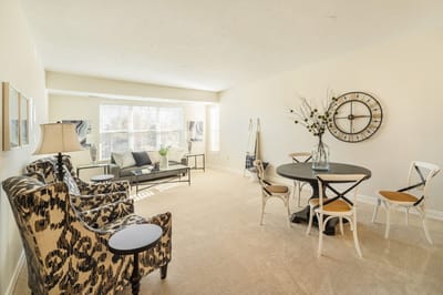 Bright interior space with seating and a dining area