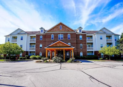 Exterior view of The Gallery Apartments with landscaped front entrance
