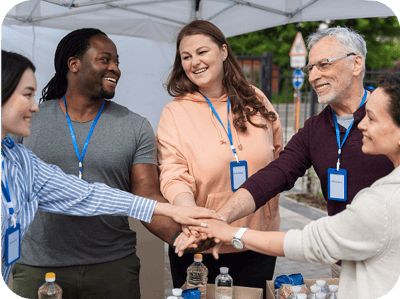 Volunteers enjoying teamwork at a community event