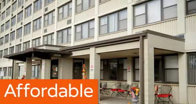 Exterior view of Joshua Arms Senior Residences building entrance
