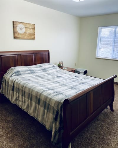 Cozy resident room with a bed and decor
