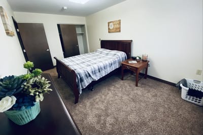 Cozy private bedroom in a senior living apartment