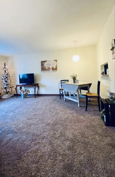 Cozy interior space with a dining table and holiday decor