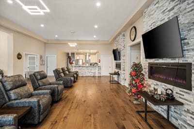 Common area with comfortable seating and holiday decor
