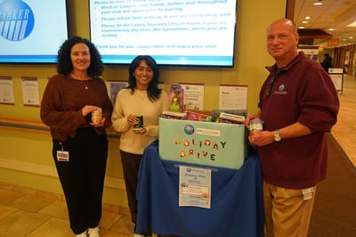 Staff participating in a holiday drive event