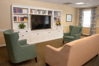 Interior common area with seating and television