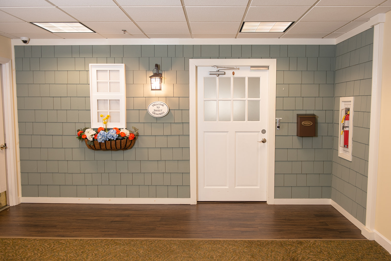 Welcoming entrance with decor and door.