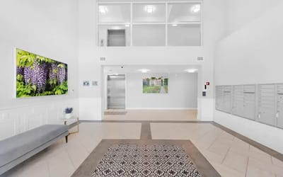 Bright, modern lobby area with flower art