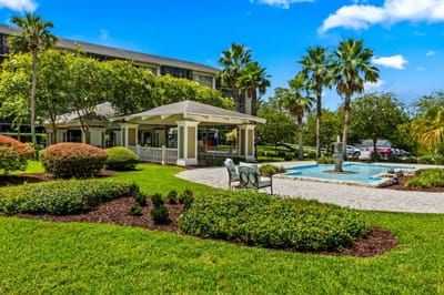 Outdoor area with landscaping and covered seating