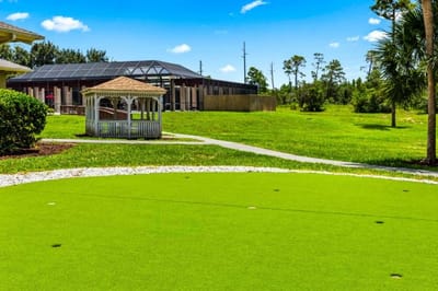 Well-maintained outdoor green space with gazebo