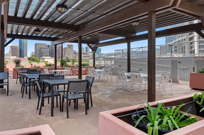 Outdoor terrace with tables and chairs
