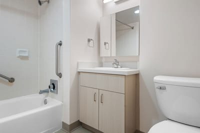 Clean and accessible bathroom with safety features