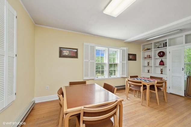 Bright common area with tables and chairs