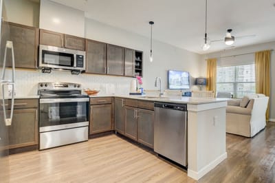 Bright and modern kitchen area in a resident's unit
