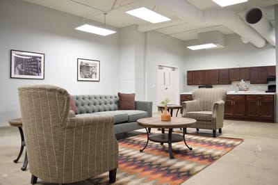 Comfortable lounge area with seating and kitchenette