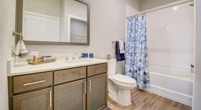 Clean and modern bathroom with shower and vanity