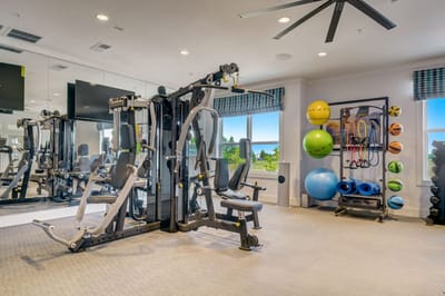 A well-equipped fitness room with gym machines