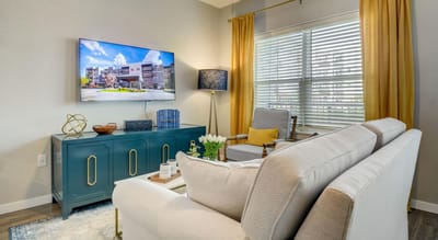 Bright common area with comfortable seating and decorations