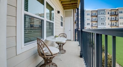 Patio seating area outside a resident unit