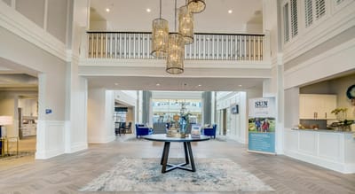 Elegant lobby area with a chandelier and seating