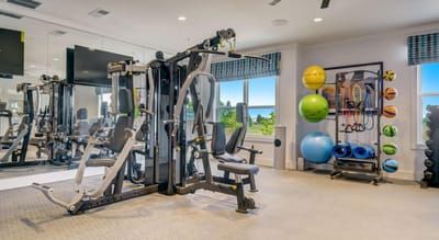 Well-equipped fitness room with various exercise machines