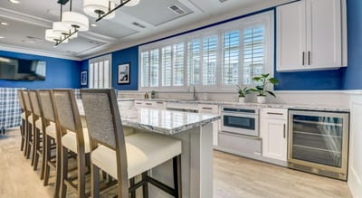 Bright interior of a common area with a kitchen bar
