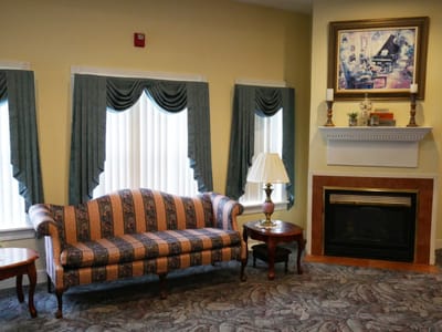 Cozy seating area with a sofa and fireplace