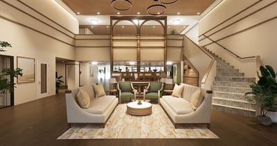 Bright lobby area with seating and staircase