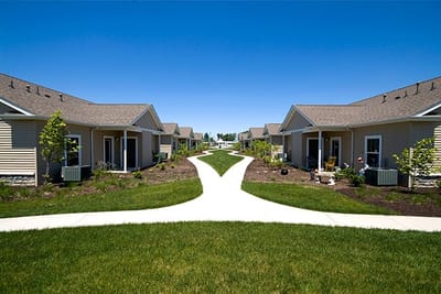 Walking paths between residential buildings in a senior living community
