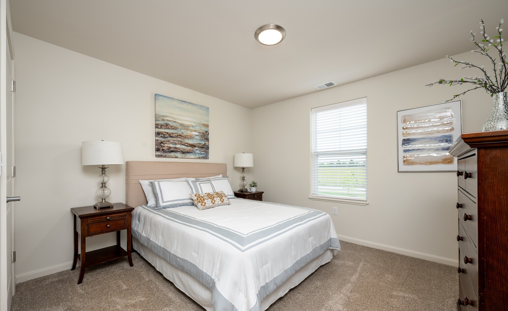 Bright bedroom in a senior apartment with modern decor